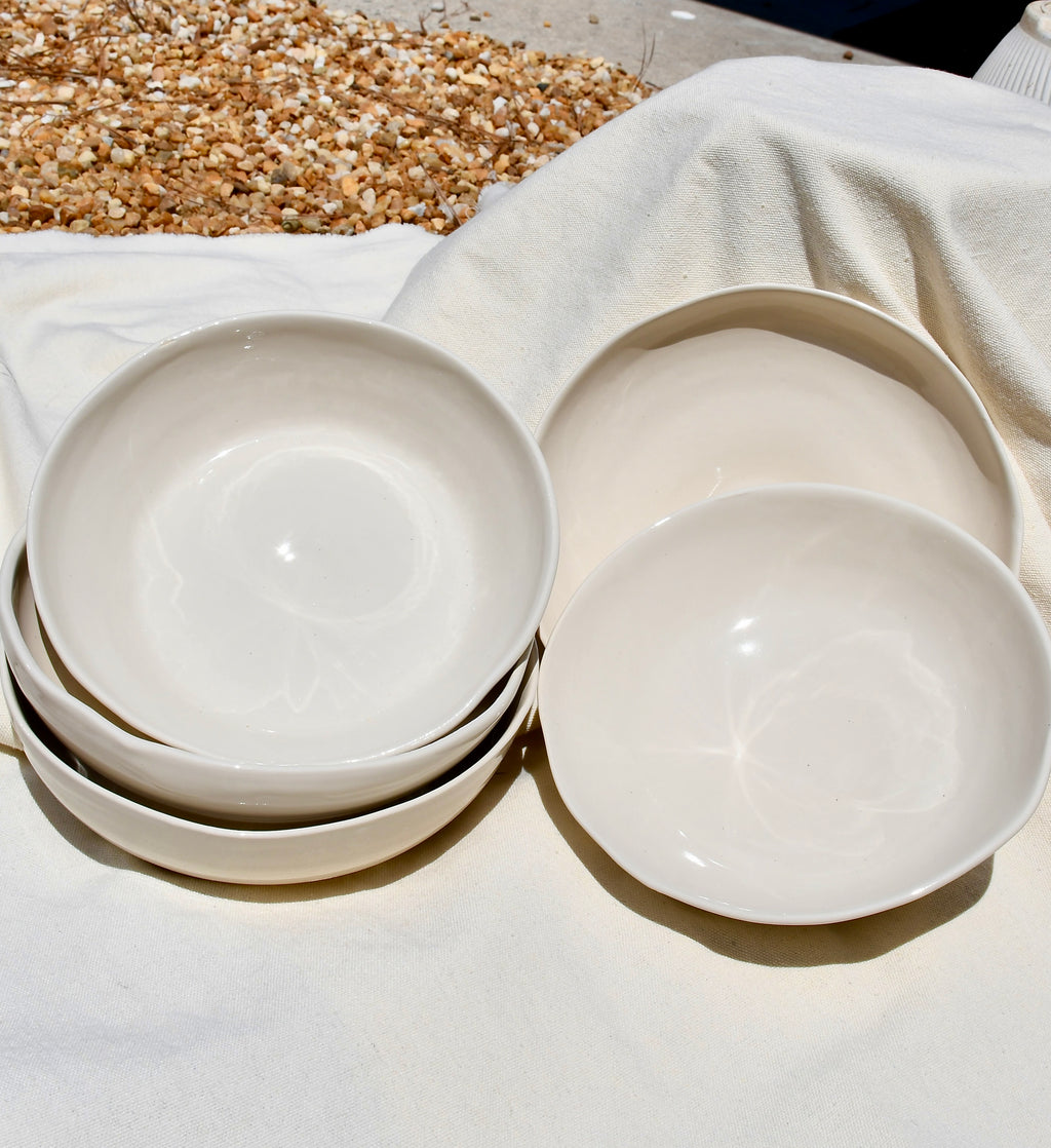 Large flat "blate" style bowls for dinner. White color. Ceramic.