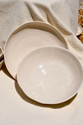 Large flat "blate" style bowls for dinner. White color. Ceramic.