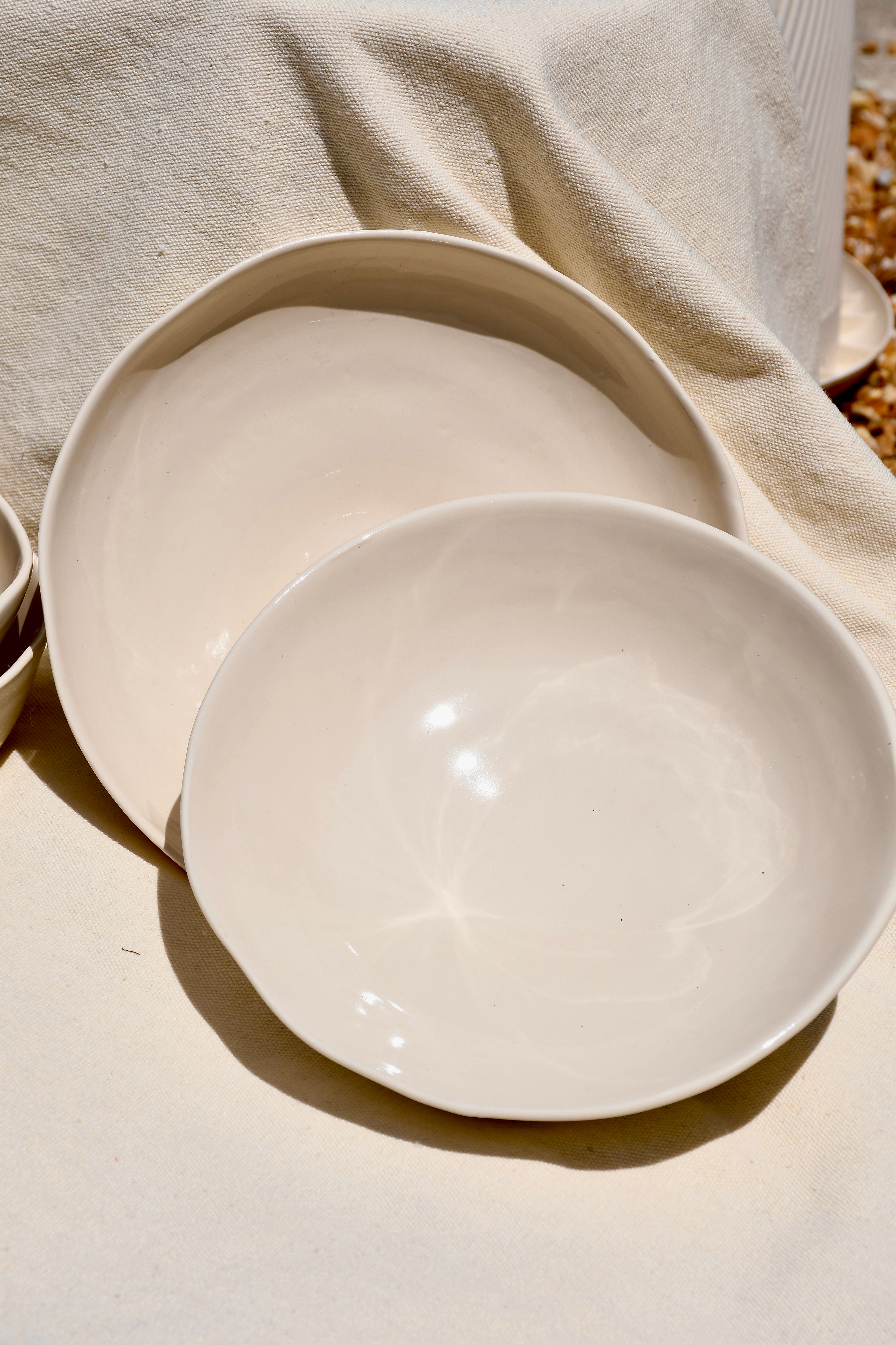 Large flat "blate" style bowls for dinner. White color. Ceramic.